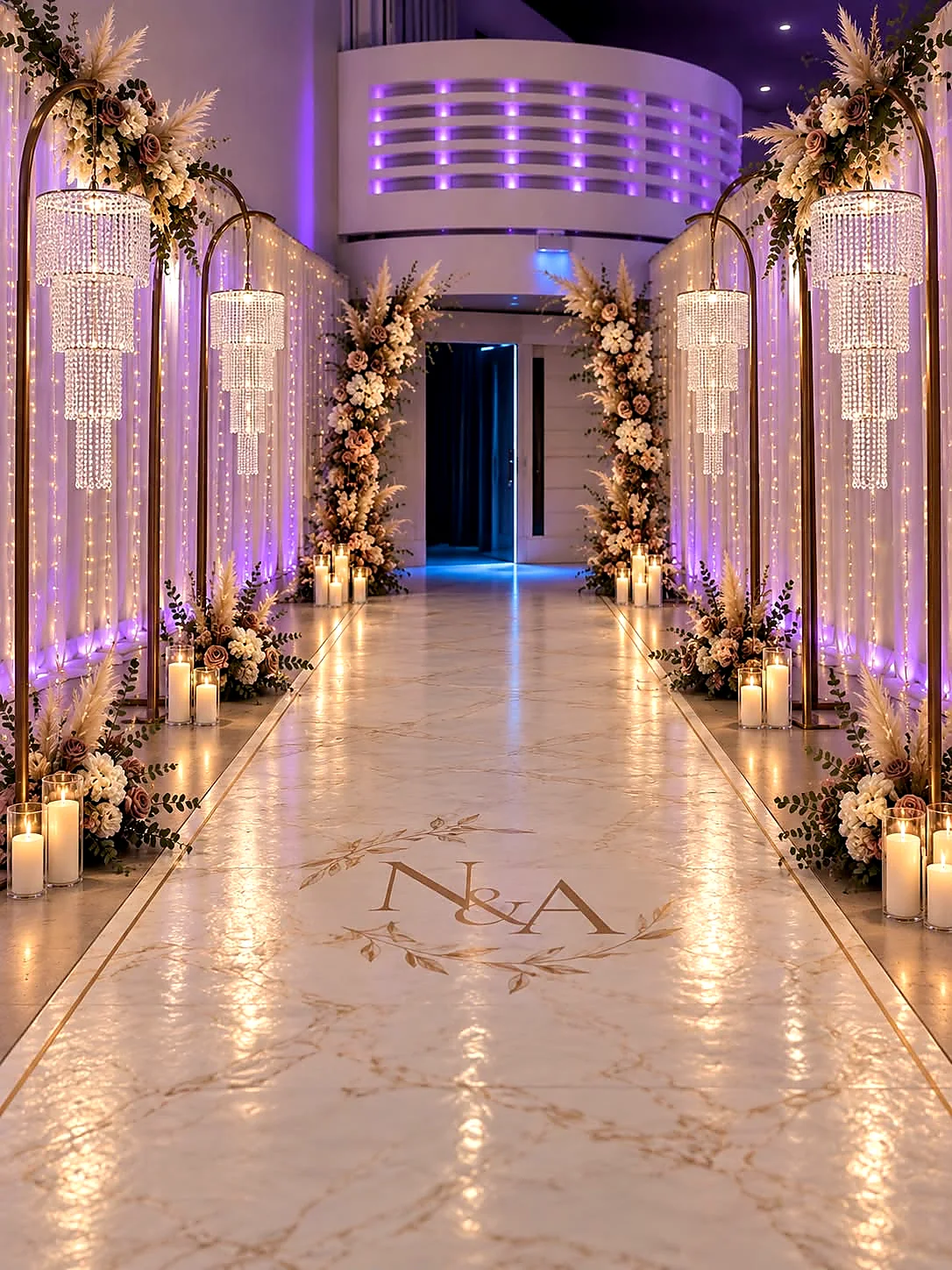 A lilac-lit indoor walkway lined with tall floral columns and candles leading to the reception